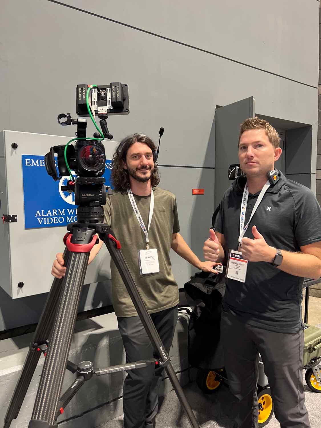 Two crew members on location